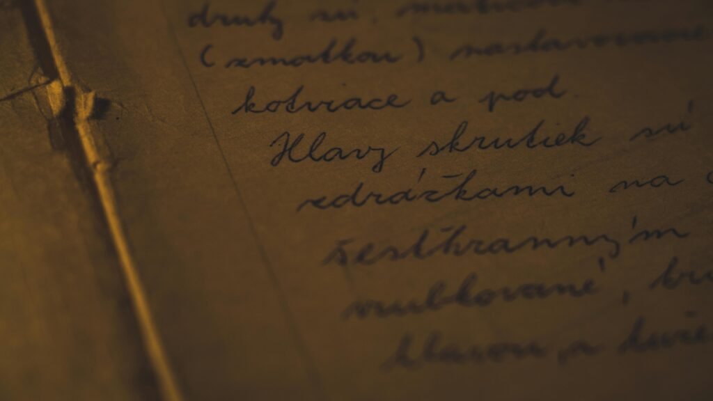 pexels-photo-716663-716663 Detailed close-up of cursive handwriting on aged paper, evoking a nostalgic feel.